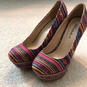 Rainbow colored platform shoes